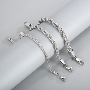 Three silver twisted rope chain bracelets in different sizes with lobster clasps on display