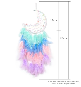 Detail showing 54cm total length and 16cm moon frame of macaron feather dream catcher