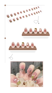 Close-up of pink gradient press-on nails with 3D butterflies and tulip floral art