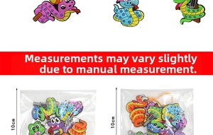 Detail view of 10cm colorful PVC cartoon snake keychains showing packaging and scale