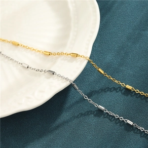 Minimalist 304L stainless steel cylindrical charm bracelets in gold and silver finish