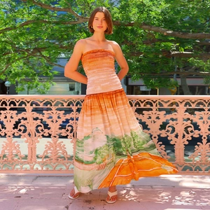Sexy backless bandeau maxi dress with vibrant sunset landscape print and pleated bodice
