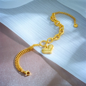 Minimalist gold heart pendant bracelet with double layered stainless steel link chains