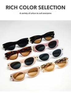 Cat eye sunglasses detail showing rich color selection with golden triangle metal accents