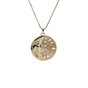 Elegant gold celestial necklace featuring a crescent moon face and radiant sun charm