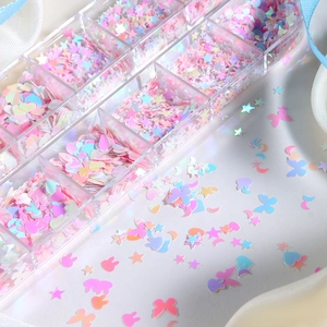 Holographic 12-slot glitter set with stars hearts and butterflies for nail art decoration