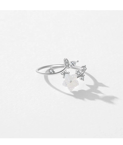Macro detail of S925 silver open ring featuring a delicate white camellia flower