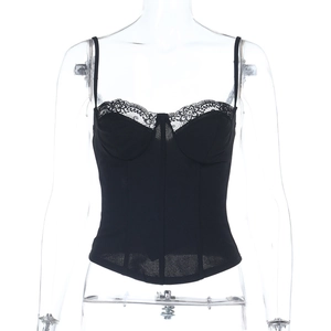 Close-up of intricate floral lace detail and structured boning on black corset top