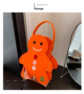 Détail du sac cabas en feutre orange en forme de bonhomme en pain d'épices