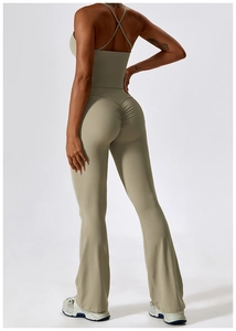 Detail view of ruched butt lifting leggings and cross back yoga top in olive green