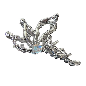 Elegant silver butterfly hair claw clip with opal gemstone and sparkling rhinestones