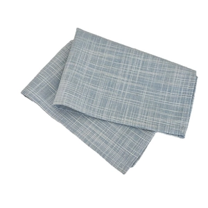 Blue and white checkered heat-resistant fabric placemat and table napkin for home