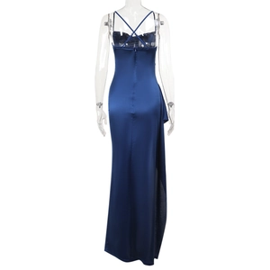 Detail of the backless criss-cross strap design on this navy blue satin maxi dress