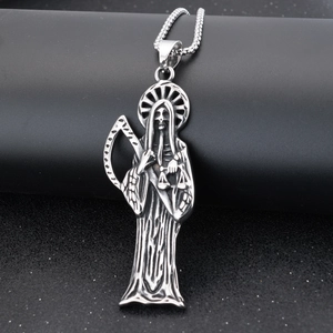 Detailed close-up of Santa Muerte pendant in vintage silver finish with intricate carving