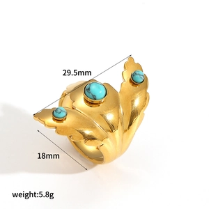 Detailed view of wide gold leaf ring with turquoise stones and 29.5mm x 18mm dimensions
