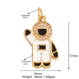 Macro detail of gold astronaut pendant showing dimensions 17x10mm and zircon inlay
