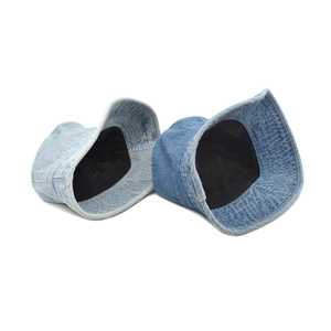 Washed denim bucket hats in light and medium blue styles for a casual look