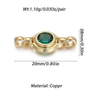 Macro detail of gold plated copper connector with green zircon and 20mm dimensions