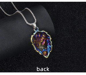 Detailed back view of a colorful lion head pendant on a silver box chain necklace