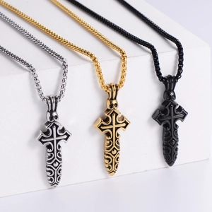 Gothic skull cross pendant necklaces in silver, gold and black on white steps