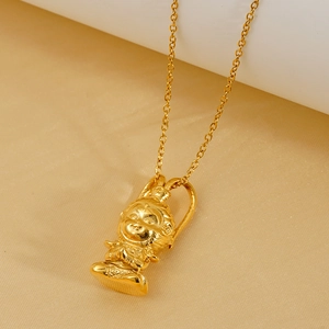 3D Gold plated stainless steel Sun Wukong pendant necklace on champagne velvet surface