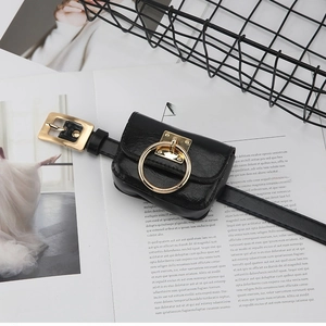 Minimalist black leather belt bag with gold square buckle and large decorative ring