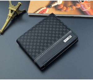 Detail of black bi-fold wallet featuring embossed checkered pattern and silver logo plate