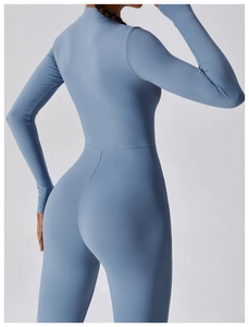 Detail view of the back of a high-elastic gray-blue long sleeve yoga bodysuit