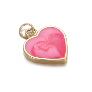 Macro shot of gold-plated heart pendant with pink enamel swirl texture and bail detail