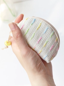 Mini woven coin purse with colorful embroidery and top zipper for earphone storage