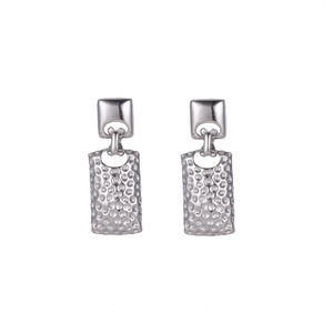 Silver rectangular drop earrings with textured hammered finish in vintage steel