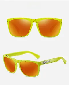 Detail view of fluorescent green sports sunglasses with red splatter and orange mirror lens