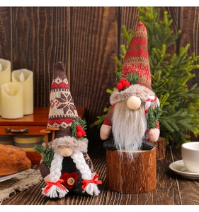 Detail of Christmas gnomes with knitted snowflake hats and festive candy cane accents