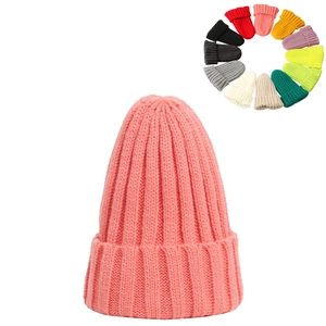 Detailed close-up of a pink knitted beanie hat with a color selection ring icon