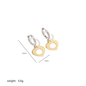 Minimalist two-tone heart drop earrings featuring silver hoops and gold heart pendants