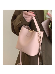 Pink PU leather bucket bag with top handle and gold-tone RACCHEE logo detail