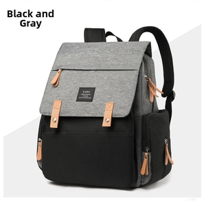 Detail of waterproof diaper bag with large capacity, leather straps, and metal buckles