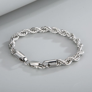 Detailed view of silver twist rope chain bracelet featuring a secure lobster clasp