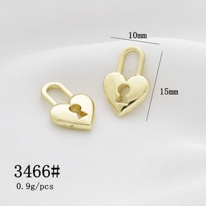 Detailed close-up of heart-shaped gold padlock charms with dimensions 15mm by 10mm