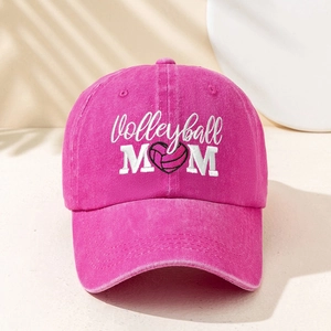 Close-up of Volleyball MOM embroidery and heart-shaped volleyball on pink washed cap