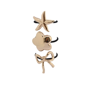 Golden irregular alloy hair ties set with starfish, flower, and bow charms for women