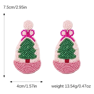 Detailed size view of handmade beaded Christmas tree earrings with pink and green beads