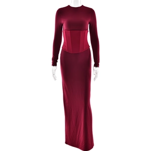 Detail view of burgundy slim fit maxi dress featuring elastic waist design and long sleeves