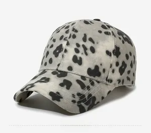 Side view of leopard print baseball cap featuring canvas fabric and curved brim details