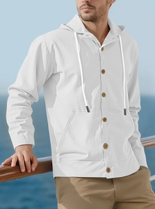 Detail of white linen blend hooded shirt featuring wooden buttons and natural drawstrings