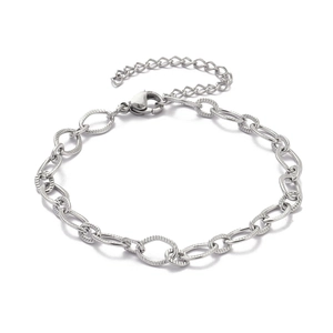 Detail of silver paperclip chain bracelet with textured links and lobster clasp