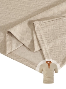Detailed close-up of khaki waffle knit fabric and contrasting brown trim on men's polo set