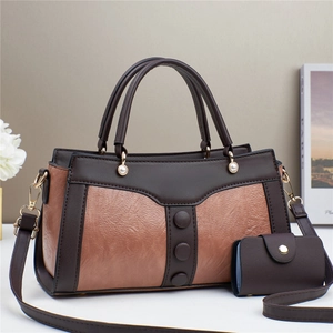 Classic dark brown and beige patchwork faux leather handbag with pearl charm for women