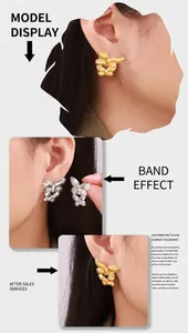 Detailed view of butterfly stud earrings in gold and silver finish worn by a model