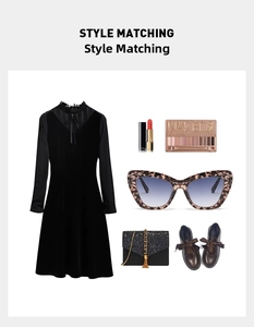 Flat lay of black velvet A-line dress with lace collar and fashion accessories set